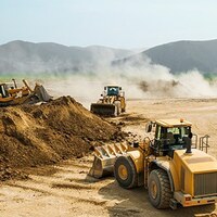 Earthwork, working machinery on a summer day