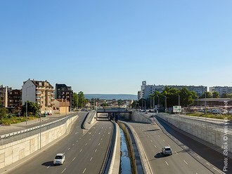 Varna, Bulgaria, July 11, 2020. Panorama of rebuilt Vasil Levski Boulevard with six lane asphalt road and storm sewer taken from the new elevated pedestrian crossing on a sunny summer day.