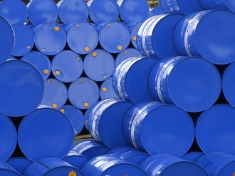 A pile with blue barrels.